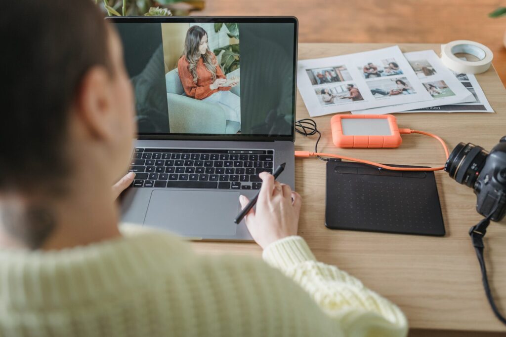 Illustration showing how to use free stock images safely and legally with a woman pointing to a screen labeled free image